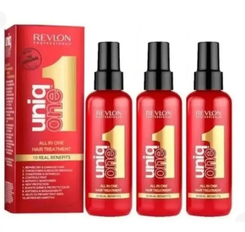 O produto apresentado é um tratamento capilar "All in One" da linha Revlon Professional Uniq One. Consiste em três frascos contendo o tratamento, e uma caixa vermelha que destaca os 10 benefícios reais do produto.