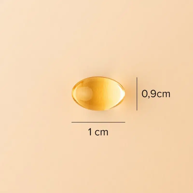 A imagem mostra a cápsula e indicações de medida: 0,9cm x 1cm.