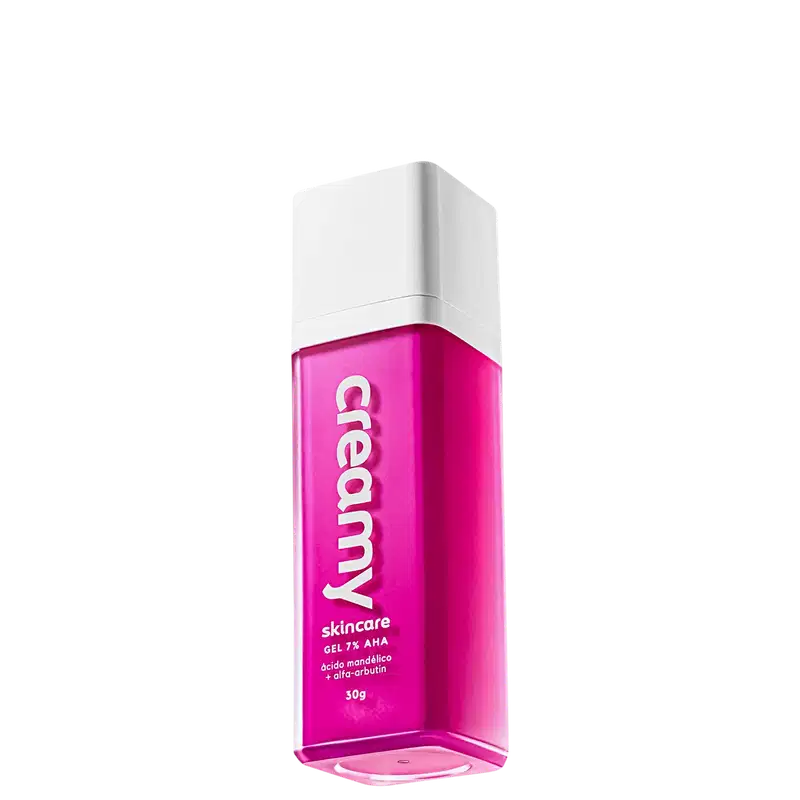 A imagem mostra o Creamy Ácido Mandélico um frasco retangular transparente de gel antiacne cor pink e tampa branca.