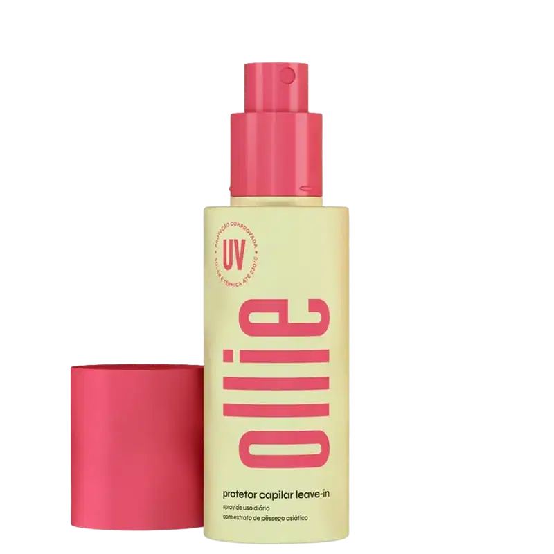 Frasco de spray de protetor capilar da marca Ollie, com embalagem amarela e rosa, contendo texto informativo sobre o produto e a indicação de proteção UV.