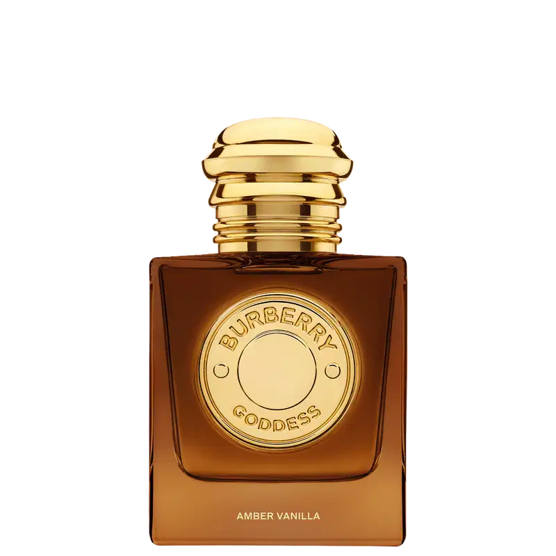 Perfume Burberry Goddess Amber Vanilla em frasco quadrado âmbar com tampa dourada. Rótulo circular dourado com inscrição "Burberry Goddess" e texto "Amber Vanilla" na base. Design luxuoso e elegante.