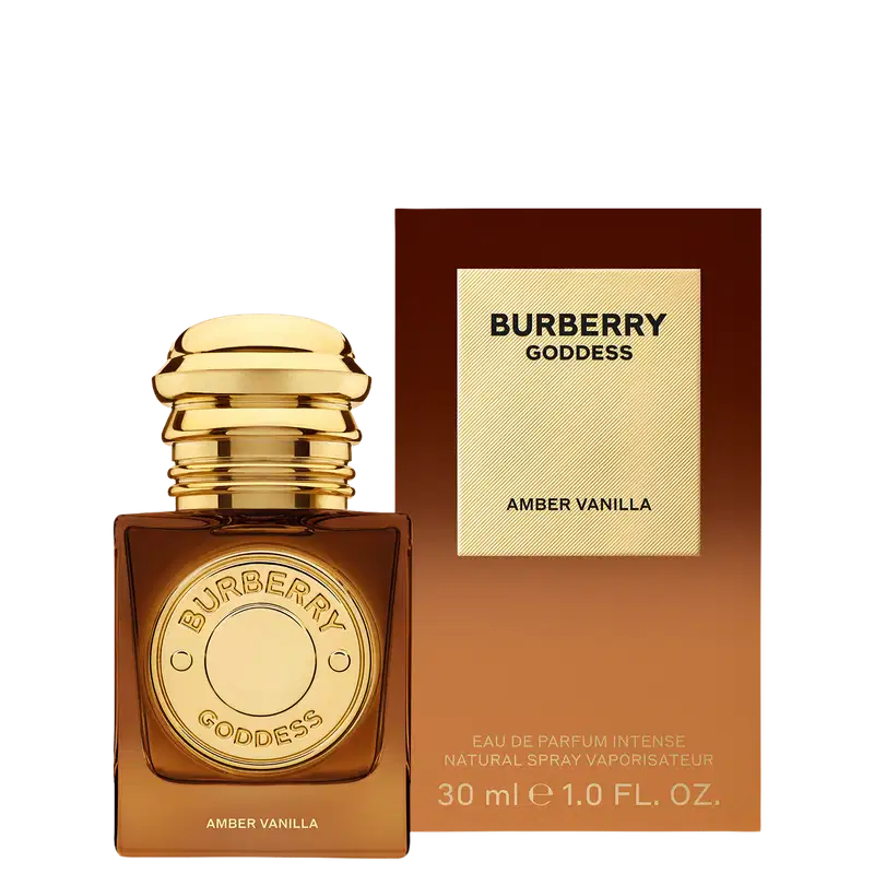 Perfume Burberry Goddess Amber Vanilla em frasco quadrado âmbar com tampa dourada. Rótulo circular dourado com inscrição "Burberry Goddess" e texto "Amber Vanilla" na base. Design luxuoso e elegante.