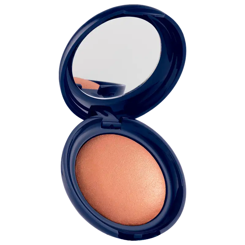 Blush em pó com embalagem redonda azul-marinho, espelho integrado na tampa e produto em tom alaranjado com acabamento luminoso.