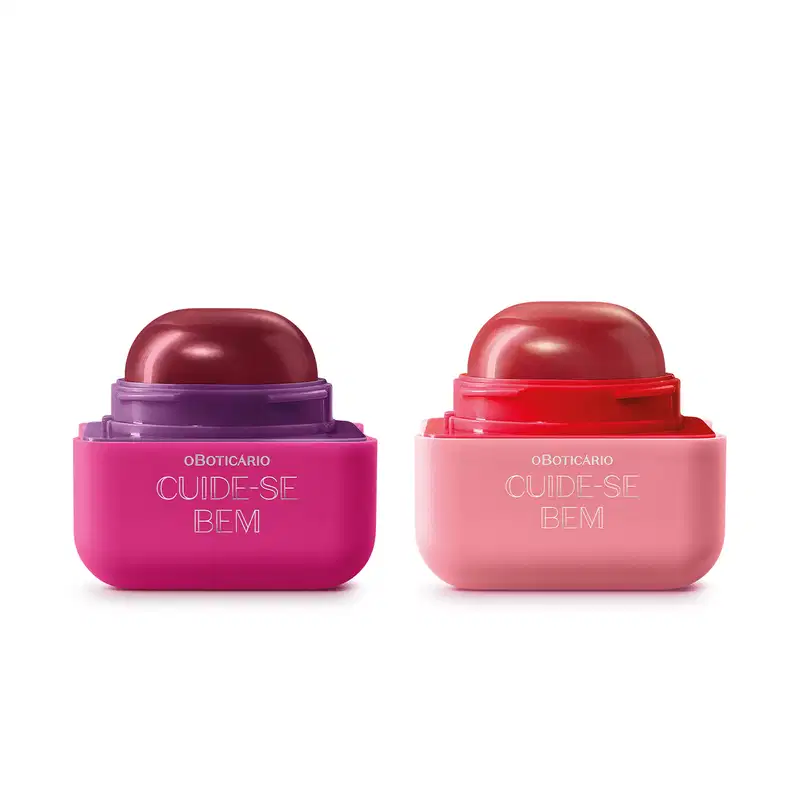 Imagem de duas embalagens de balm labial da marca Cuide-se Bem Feira Quem Disse, Berenice?, uma na cor rosa com tampa roxa e sabor de amora e outra na cor rosa com tampa rosa-escuro e sabor de framboesa.