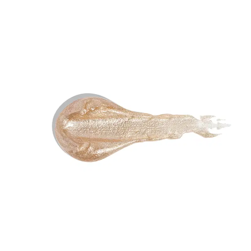 Textura dourada brilhante e cremosa do gloss labial dourado Douradex Dos Sonhos Quem Disse, Berenice?, com superfície lisa e uniforme, ocupando a maior parte da imagem.