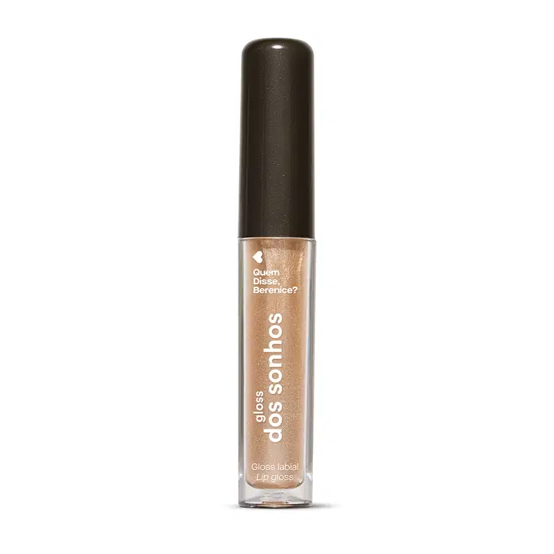 Gloss labial dourado Douradex Dos Sonhos Quem Disse, Berenice?  em embalagem transparente, mostrando a tonalidade do produto, tampa preta e rótulo com letras brancas.