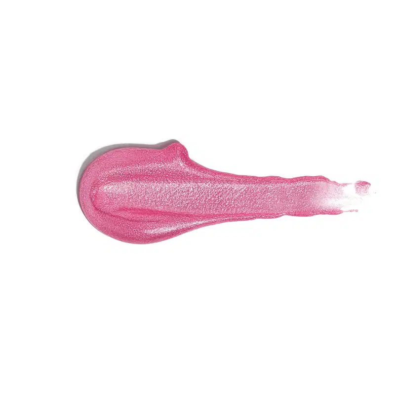 Textura rosa brilhante e cremosa do gloss labial rosa Rosadex Dos Sonhos Quem Disse, Berenice?, com superfície lisa e uniforme, ocupando a maior parte da imagem.