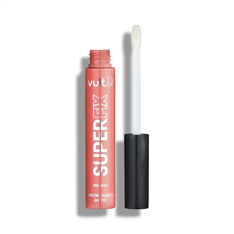 O produto apresentado é um batom líquido matte da marca Vult, na cor castanho. A embalagem é um tubo plástico castanho com o nome da marca e do produto visíveis. O aplicador é branco e alongado, típico de batons líquidos.