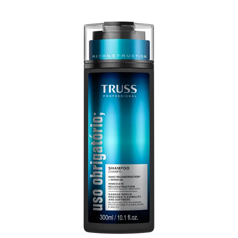 Frasco de shampoo da marca TRUSS Professional, com embalagem em tons de azul e preto, apresentando o nome da linha "Uso Obrigatório" e informações sobre a fórmula com "Nano Reconstruction" e "Monoi Oil".