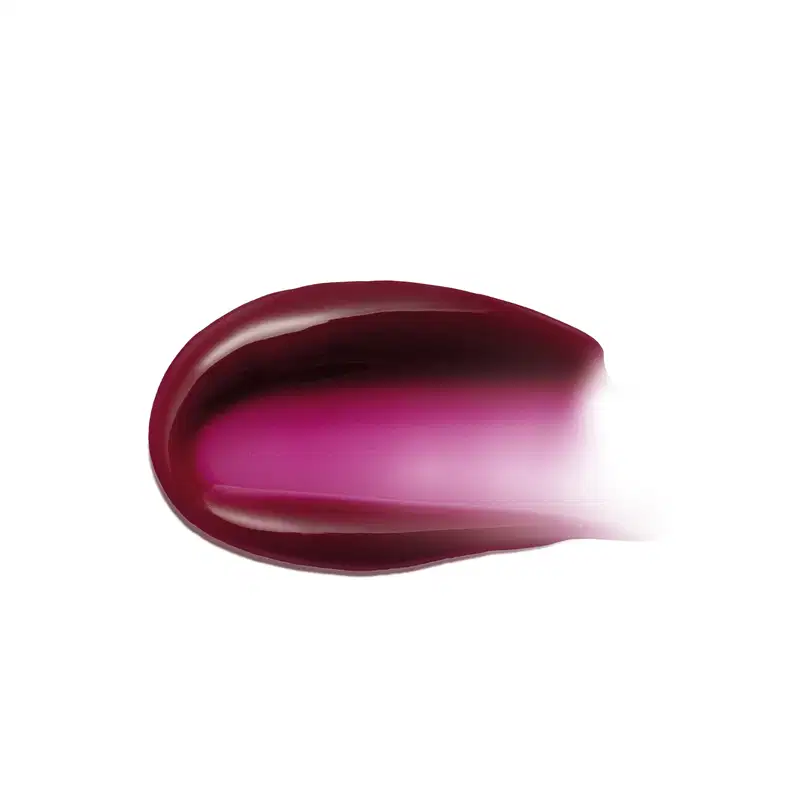 Imagem da textura cremosa e brilhante do hidratante labial, com gradiente de cor que varia do vermelho escuro ao rosa vibrante.