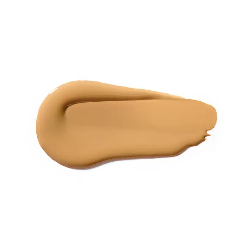 Textura cremosa e suave, com tonalidade amarelo-dourada, apresentando aspecto homogêneo e brilho sutil, característico de um produto de beleza da marca Vult.