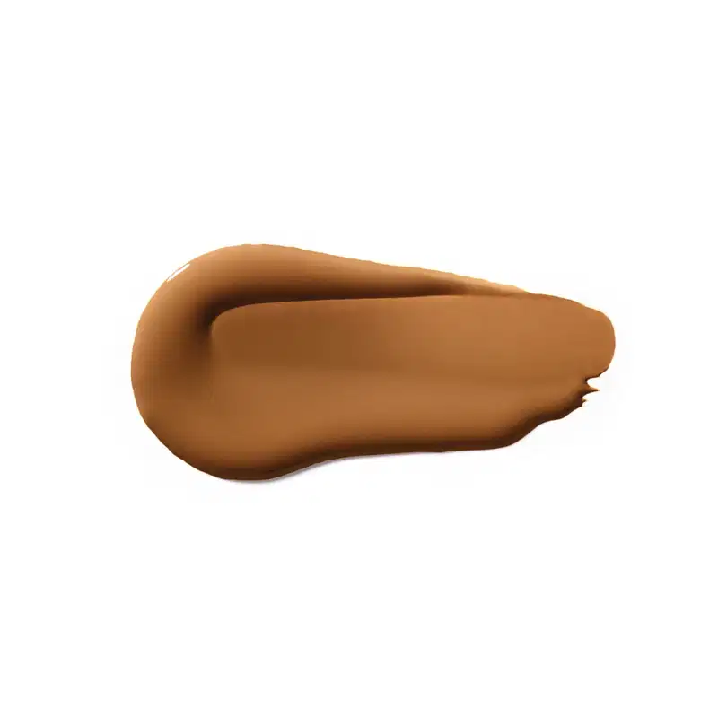 Textura cremosa e uniforme em tom de caramelo, com aparência suave e sedosa, típica de produtos de beleza da marca Vult.