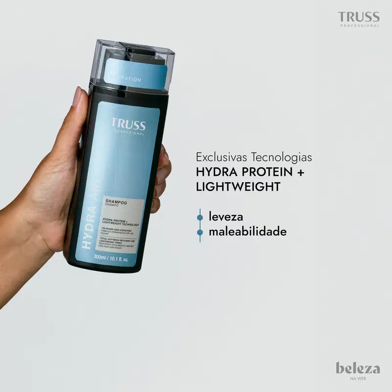 Frasco de shampoo da marca TRUSS com tecnologia Hydra Protein + Lightweight, destacando leveza e maleabilidade do produto.