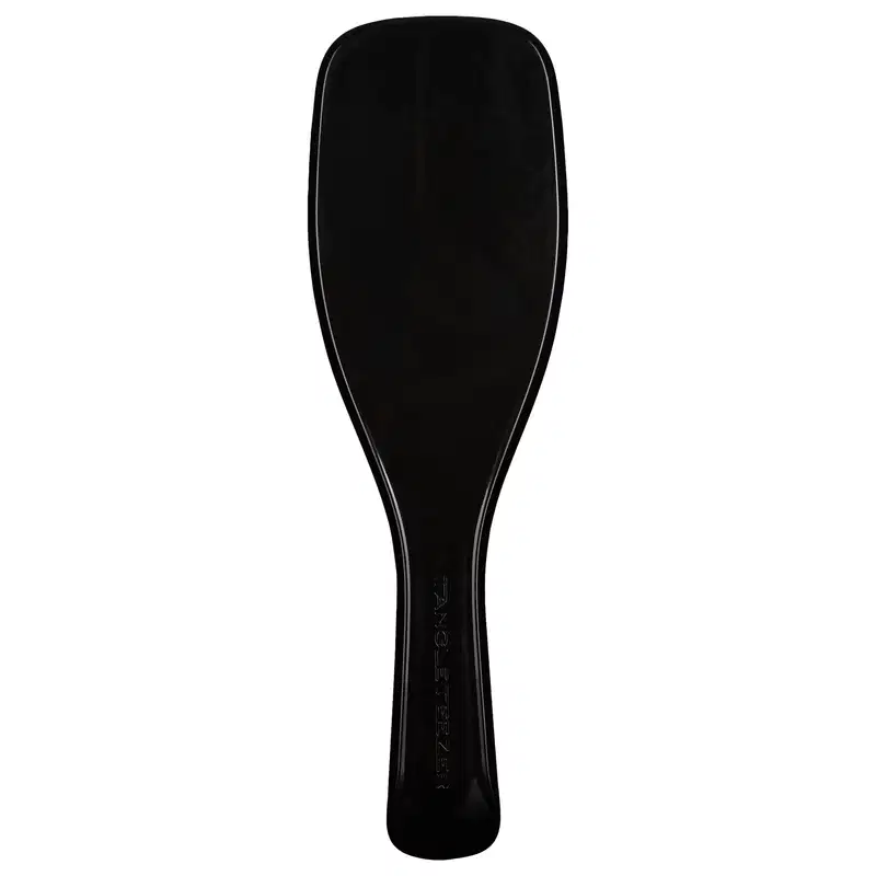 Escova de cabelo preta da marca Tangle Teezer, com design ergonômico e superfície ponteada para facilitar o desembaraço dos fios.