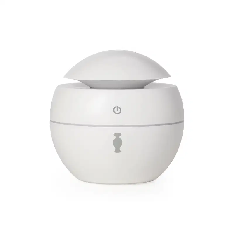 Aromatizador elétrico de ambientes branco com tampa em formato de cúpula, botão power cinza no topo e ícone da marca O Boticário no corpo do pote.