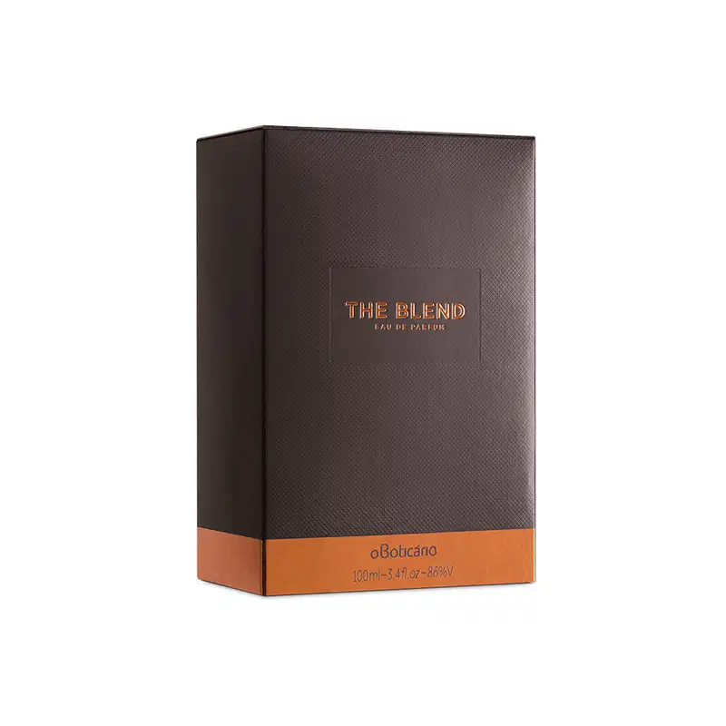 Caixa de Eau de Parfum The Blend 100ml, em embalagem marrom com faixa laranja na base e texto dourado na frente.