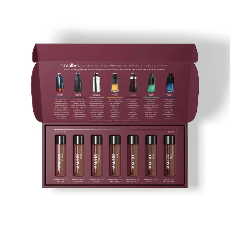 Caixa roxa contendo sete vidros transparente com tampa preta e letras brancas que trazem uma amostra das diversas linhas da marca Malbec para experimentação, sendo as linhas Flame, Black, Magnetic, Gold, Vert, Bleu e a Original.
