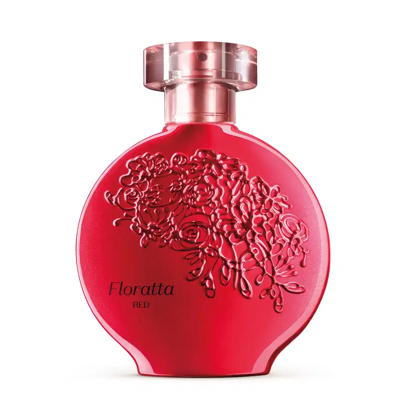 A imagem mostra um frasco de perfume da linha Floratta Red. O frasco tem um design arredondado e é feito de vidro vermelho brilhante. A parte superior é de metal rosado. O nome "Floratta Red" está inscrito em letras elegantes na parte inferior do frasco.