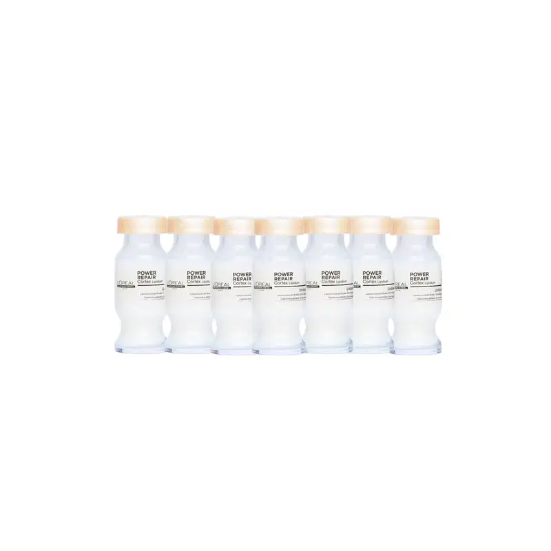 Frascos brancos da linha Power Repair da L'Oréal Professionnel, com tampas douradas, exibindo o nome do produto em destaque. Os frascos estão alinhados em uma fileira, sugerindo uma apresentação de produtos de cuidados capilares.