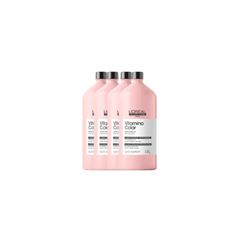 Quatro frascos de condicionador profissional da linha Vitamino Color da L'Oréal Paris, com embalagem rosa clara e rótulos pretos destacando o nome do produto.