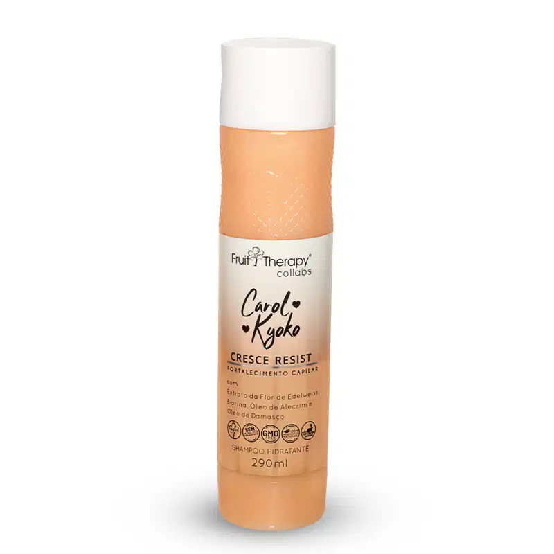 A imagem mostra uma embalagem de shampoo de cor clara com detalhes em tom de laranja. Contém 290ml do produto. Também indica que o produto é vegano, não testado em animais e livre de parabenos, segundo os selos presentes na embalagem.
