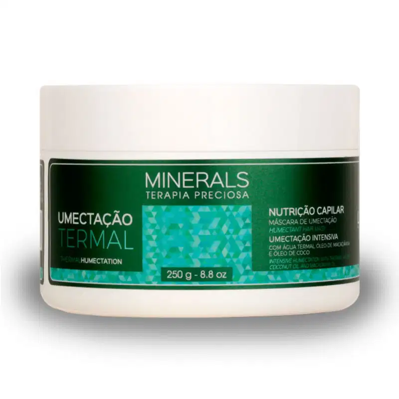 A imagem traz a máscara de tratamento da linha Minerals Terapia Preciosa Umectação Capilar. O produto vem em um pote de 250g feito de plástico branco com rótulo verde, e promete umectação intensiva aos fios.