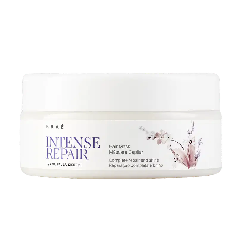 Embalagem branca com rótulo roxo e floral da linha Intense Repair da marca Braé, contendo máscara capilar para reparação e brilho completos dos cabelos.