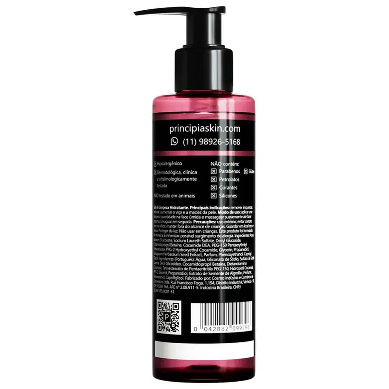 Frasco de produto de beleza da marca Principia, com embalagem rosa e preta, contendo informações sobre o produto e seus ingredientes. O frasco possui um rótulo com o site e contato da empresa.