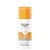 Frasco de protetor solar Eucerin Oil Control Tinted com FPS 70, embalagem laranja e branca, com rótulo indicando tecnologia espectral avançada e propriedades antioleosilidade.