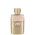Frasco de item de perfumaria da marca Gucci com tampa dourada, apresentando aroma que abraça a pele com sofisticação e longa duração, inspirado no espírito independente da mulher que assume seus desejos.